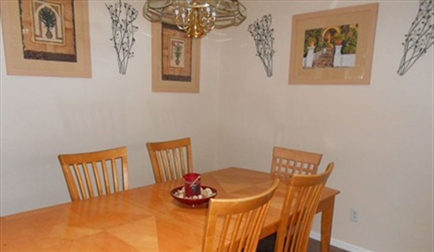with a large dining table . Disney on Your Doorstep in Indian Creek, Kissimmee, Orlando