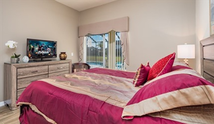 Queen Bedroom overlooking Pool/Lake. Brown's Villa in Cumbrian Lakes, Kissimmee, Orlando