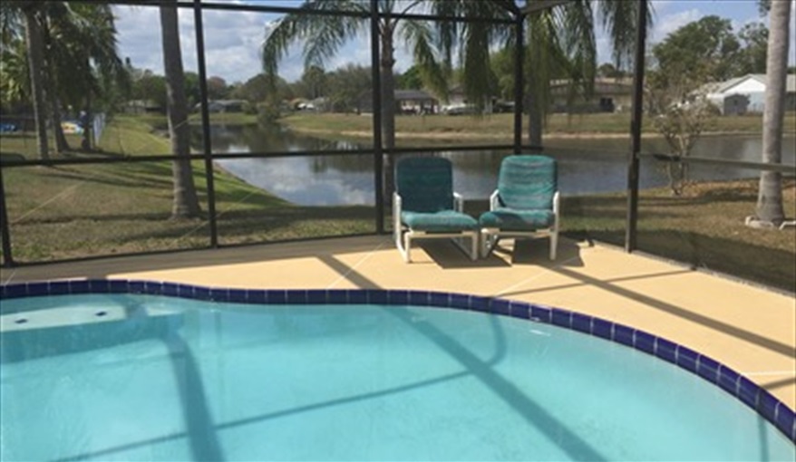 View from Lounge of Pool and Lake. FLORIDA HOME in Pine Chase Estates, St Cloud, Gulf Coast