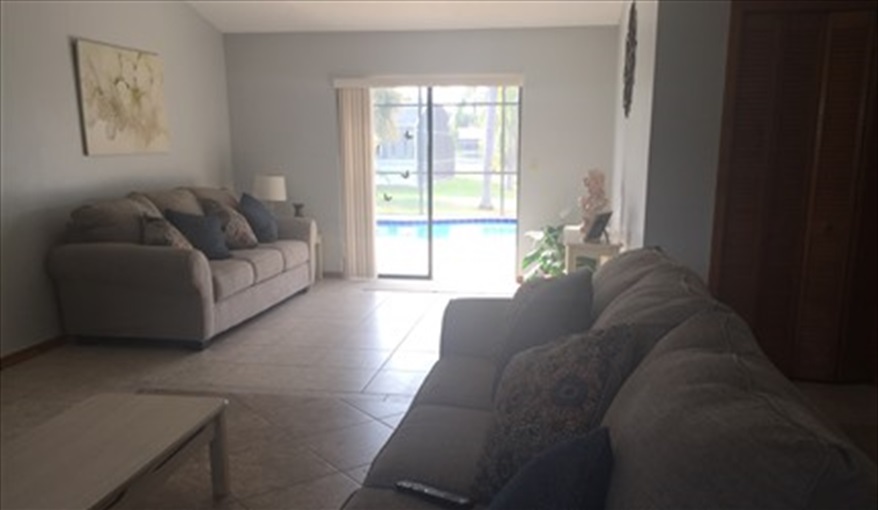  Lounge overlooking Pool and Lake. FLORIDA HOME in Pine Chase Estates, St Cloud, Gulf Coast