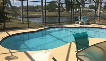 Peaceful View of Pool and Lake. FLORIDA HOME in Pine Chase Estates, St Cloud, Gulf Coast