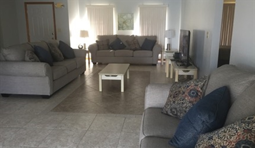 3 Three Seater Sofas in Lounge. FLORIDA HOME in Pine Chase Estates, St Cloud, Gulf Coast