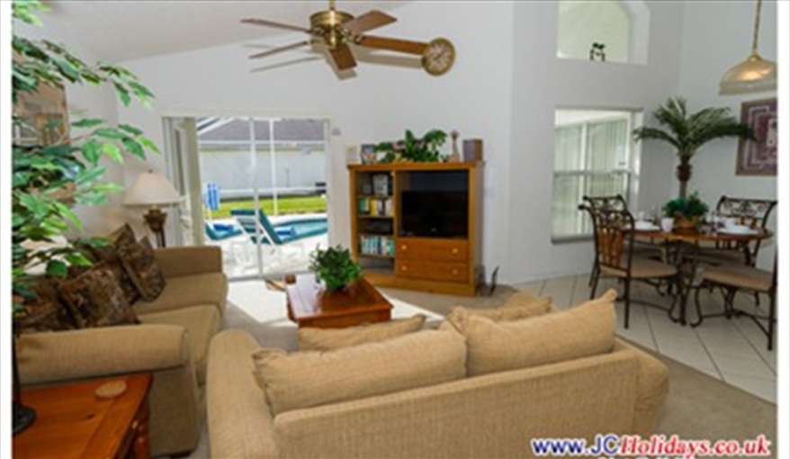 Great Room with LCD HD TV with apps and Blu-Ray Player. JCHolidays in The Manors At Westridge, Davenport, Orlando