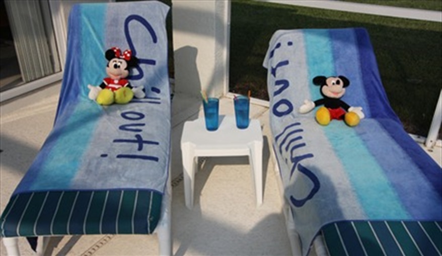 Mickey and Minnie are waiting for you on the pool deck.. JCHolidays in The Manors At Westridge, Davenport, Orlando