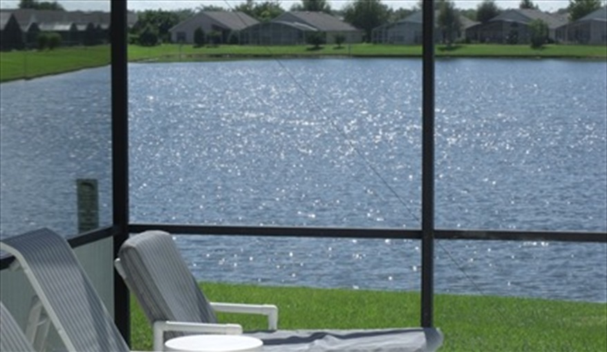 Enjoy the view from your comfortable sun bed. Waterside in Eagle Pointe, Kissimmee, Orlando