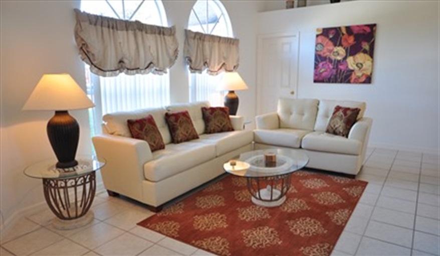 The first lounge is light bright and very spacious .... Palm Tree Villa - Pool Lift, 5 STAR RATING in Doral Woods, Kissimmee, Orlando