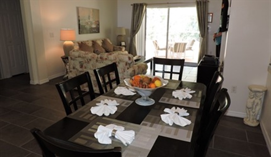Open plan kitchen with Separate Dining area  . . .. Villa Paradiso  in Eagle Pointe, Kissimmee, Orlando
