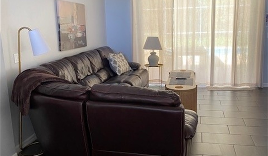 Living Area overlooking patio. Villa Paradiso  in Eagle Pointe, Kissimmee, Orlando