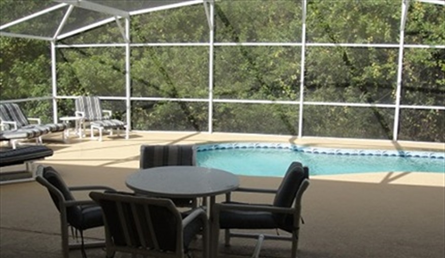 Large Pool with Extended/Covered Lanai - Ideal for Alfresco dining!. Villa Paradiso  in Eagle Pointe, Kissimmee, Orlando