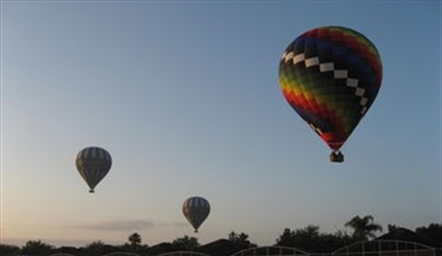 Watch the early morning balloons drift overhead. My Florida House  in Esprit, Davenport, Orlando