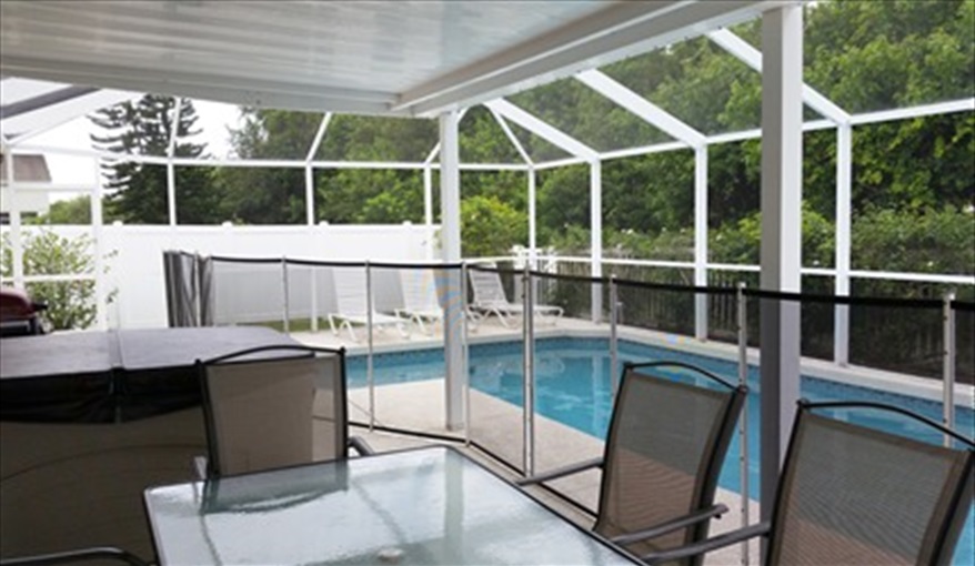 Large 30' x 16' private pool with separate hot tub & removable safety fence. Sanibel - 4 bed villa at Sabal Harbour in Sabal Harbour, Bradenton, Gulf Coast
