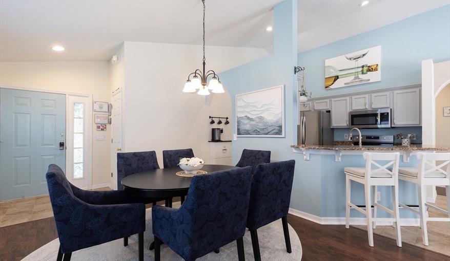 Open kitchen and dining layout designed for connection, comfort, and easy entertaining.. For the Best Disney Vacation-Tropical Paradise Villa in Emerald Island Resort, Kissimmee, Orlando