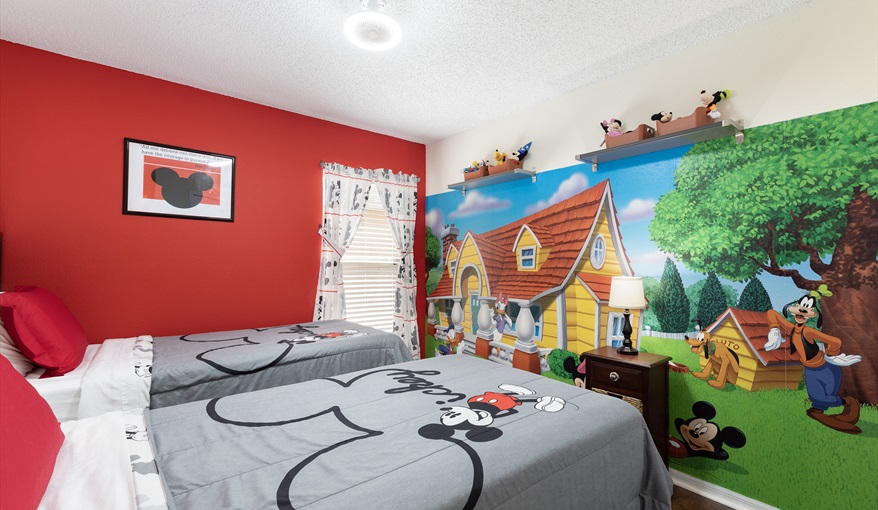 Playful Mickey-themed bedroom with two twin beds—perfect for kids and Disney fans.. For the Best Disney Vacation-Tropical Paradise Villa in Emerald Island Resort, Kissimmee, Orlando