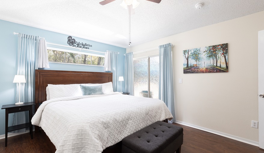Light-filled king bedroom with private access and thoughtfully designed comfort.. For the Best Disney Vacation-Tropical Paradise Villa in Emerald Island Resort, Kissimmee, Orlando