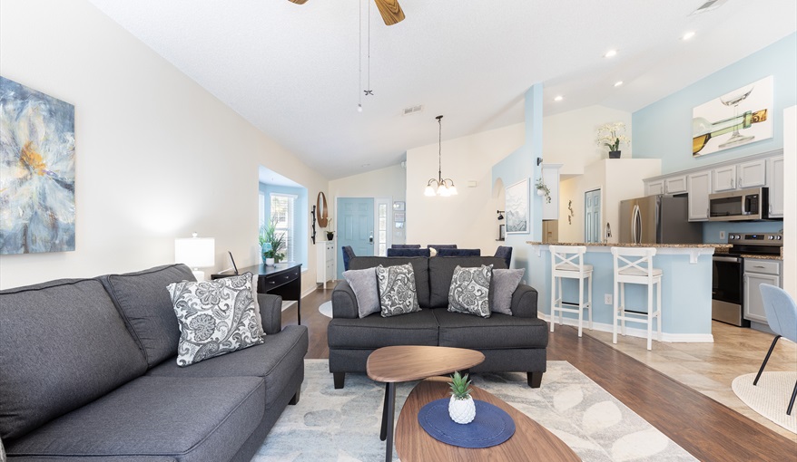 Bright, open-concept living space with seamless flow from kitchen to lounge—perfect for relaxing and. For the Best Disney Vacation-Tropical Paradise Villa in Emerald Island Resort, Kissimmee, Orlando