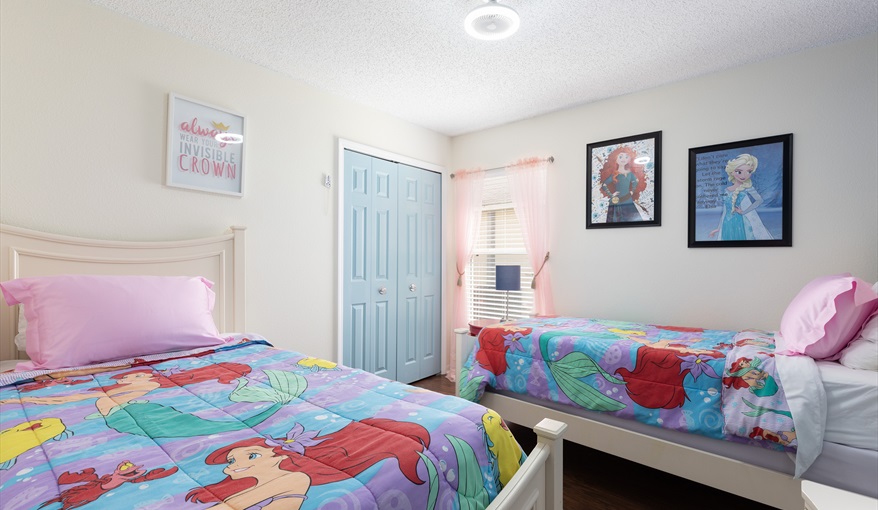 Bright and cheerful princess-themed room with two twin beds and charming décor.. For the Best Disney Vacation-Tropical Paradise Villa in Emerald Island Resort, Kissimmee, Orlando