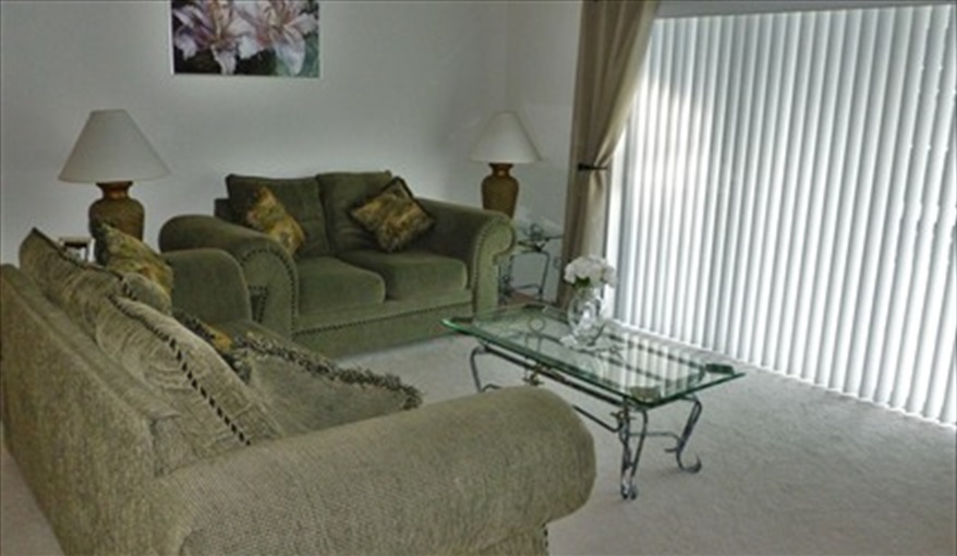 Living Room. Westridge Palms----Free Wi-Fi, Free calls to the UK, Gas BBQ,Pool table ,Table tennis,  in Westridge, Davenport, Orlando