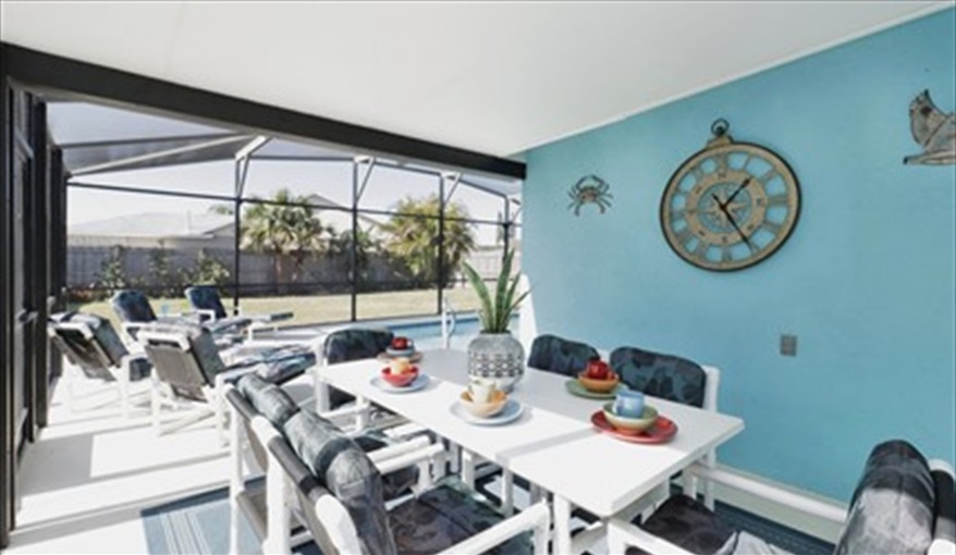 Outdoor dining . . .. KissimmeeDisneyVilla in Indian Point, Kissimmee, Orlando