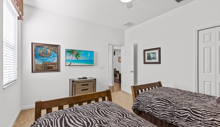 Safari luggage furniture and animal print bedding. Goofys Golf Getaway - Luxury Executive Disney Villa on Golf Course Gated Community, South Facing Pool,  No Rear Neighbours and Conservation Views in Providence, Davenport, Orlando