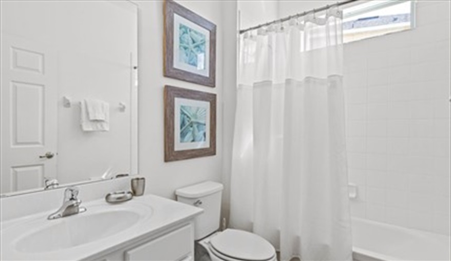 The downstairs shared bathroom. Goofys Golf Getaway - Luxury Executive Disney Villa on Golf Course Gated Community, South Facing Pool,  No Rear Neighbours and Conservation Views in Providence, Davenport, Orlando