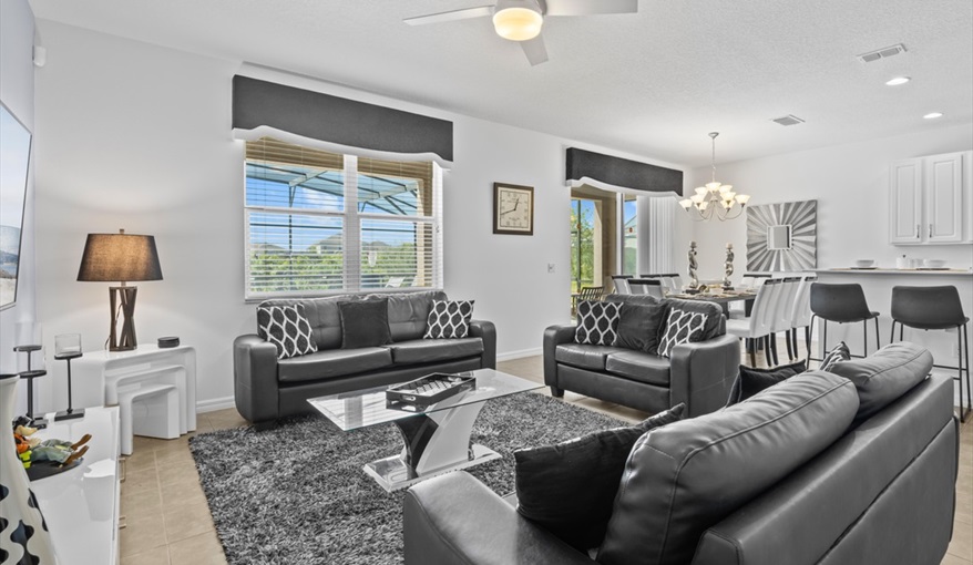 Lots of comfortable seating. Goofys Golf Getaway - Luxury Executive Disney Villa on Golf Course Gated Community, South Facing Pool,  No Rear Neighbours and Conservation Views in Providence, Davenport, Orlando