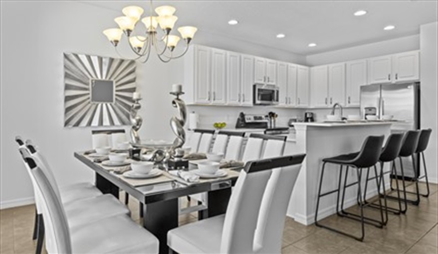 Dining area. Goofys Golf Getaway - Luxury Executive Disney Villa on Golf Course Gated Community, South Facing Pool,  No Rear Neighbours and Conservation Views in Providence, Davenport, Orlando
