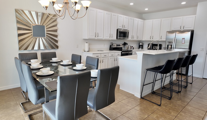 Dining area with seating for 8. Goofys Golf Getaway - Luxury Executive Disney Villa on Golf Course Gated Community, South Facing Pool,  No Rear Neighbours and Conservation Views in Providence, Davenport, Orlando