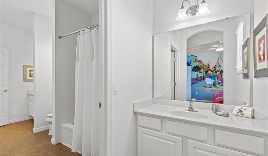 Magic Kingdom private bathroom. Goofys Golf Getaway - Luxury Executive Disney Villa on Golf Course Gated Community, South Facing Pool,  No Rear Neighbours and Conservation Views in Providence, Davenport, Orlando