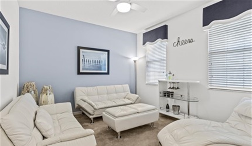 Our "chill out" room at the front of the house. Goofys Golf Getaway - Luxury Executive Disney Villa on Golf Course Gated Community, South Facing Pool,  No Rear Neighbours and Conservation Views in Providence, Davenport, Orlando