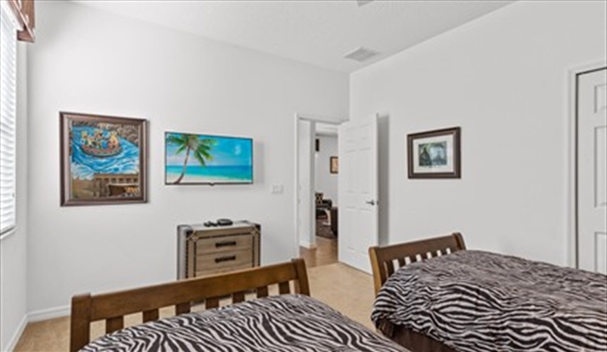 Safari luggage and animal print bedding. Goofys Golf Getaway - Luxury Executive Disney Villa on Golf Course Gated Community, South Facing Pool,  No Rear Neighbours and Conservation Views in Providence, Davenport, Orlando