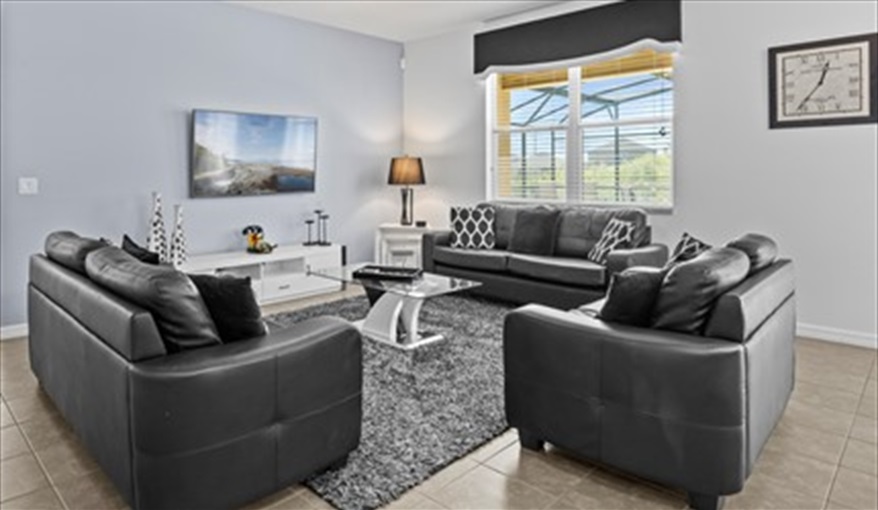 Family gather area. Goofys Golf Getaway - Luxury Executive Disney Villa on Golf Course Gated Community, South Facing Pool,  No Rear Neighbours and Conservation Views in Providence, Davenport, Orlando