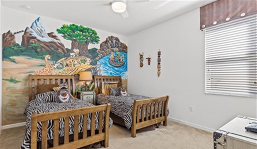 The twin Animal Kingdom themed bedroom. Goofys Golf Getaway - Luxury Executive Disney Villa on Golf Course Gated Community, South Facing Pool,  No Rear Neighbours and Conservation Views in Providence, Davenport, Orlando