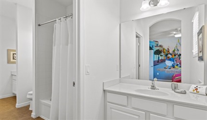 Magic Kingdom private bathroom. Goofys Golf Getaway - Luxury Executive Disney Villa on Golf Course Gated Community, South Facing Pool,  No Rear Neighbours and Conservation Views in Providence, Davenport, Orlando