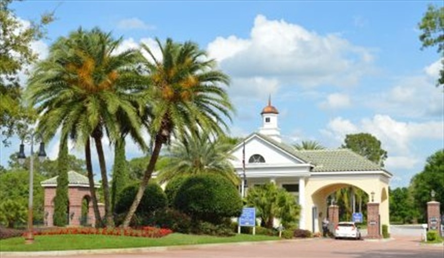 Providence entrance and gatehouse. Goofys Golf Getaway - Luxury Executive Disney Villa on Golf Course Gated Community, South Facing Pool,  No Rear Neighbours and Conservation Views in Providence, Davenport, Orlando