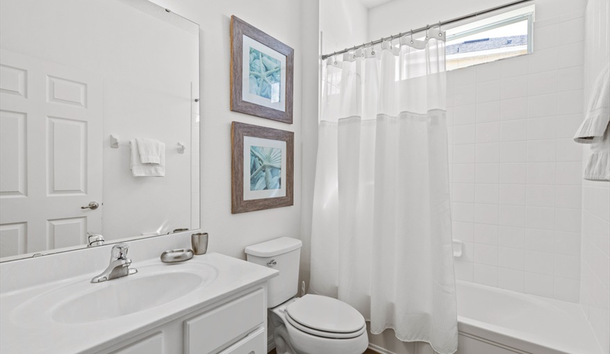 The downstairs shared bathroom. Goofys Golf Getaway - Luxury Executive Disney Villa on Golf Course Gated Community, South Facing Pool,  No Rear Neighbours and Conservation Views in Providence, Davenport, Orlando