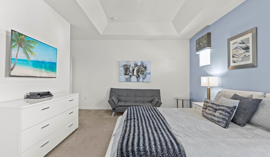 Leather sofa for additional seating. Goofys Golf Getaway - Luxury Executive Disney Villa on Golf Course Gated Community, South Facing Pool,  No Rear Neighbours and Conservation Views in Providence, Davenport, Orlando