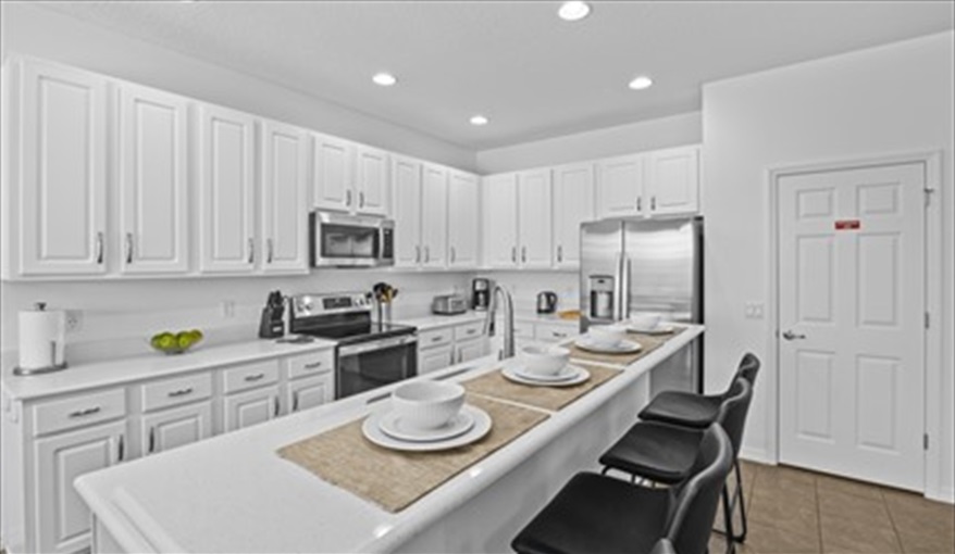 Fully equipped kitchen. Goofys Golf Getaway - Luxury Executive Disney Villa on Golf Course Gated Community, South Facing Pool,  No Rear Neighbours and Conservation Views in Providence, Davenport, Orlando