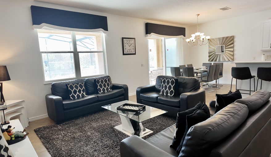 Lots of comfortable seating. Goofys Golf Getaway - Luxury Executive Disney Villa on Golf Course Gated Community, South Facing Pool,  No Rear Neighbours and Conservation Views in Providence, Davenport, Orlando