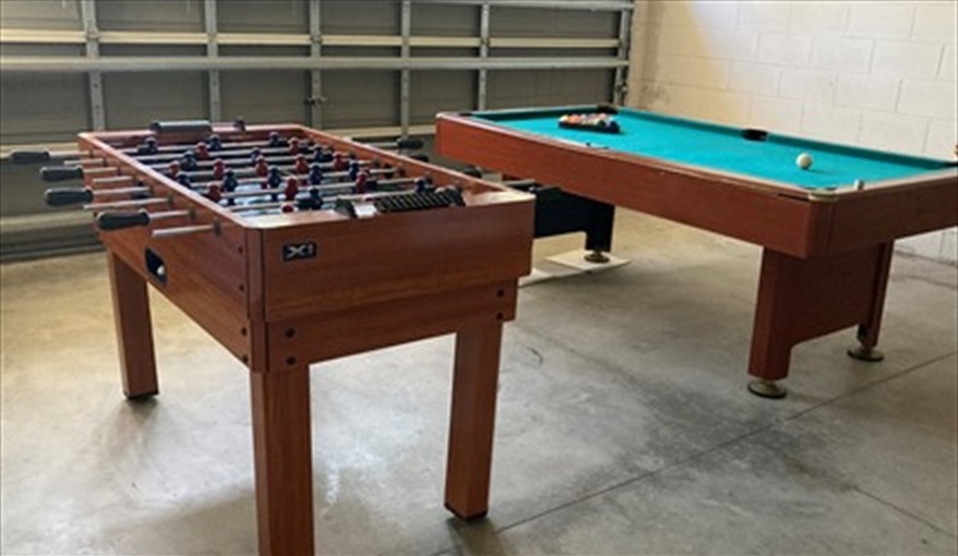 Pool and fusball tables in the garage. Villa Verna in Indian Creek, Kissimmee, Orlando