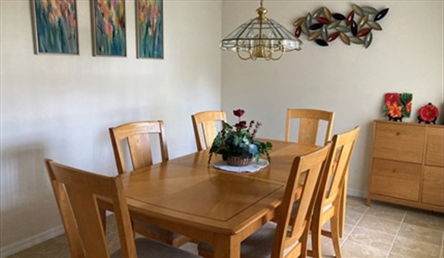 Dining area for more formal dining - table & 6 chairs. Villa Verna in Indian Creek, Kissimmee, Orlando