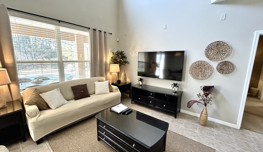 Family Room. Watersong Villa Florida. 6 Bedrooms 5.5 Bathrooms with 4 en-suite. Conservation Views. Pool & Spa.  in Watersong, Davenport, Orlando