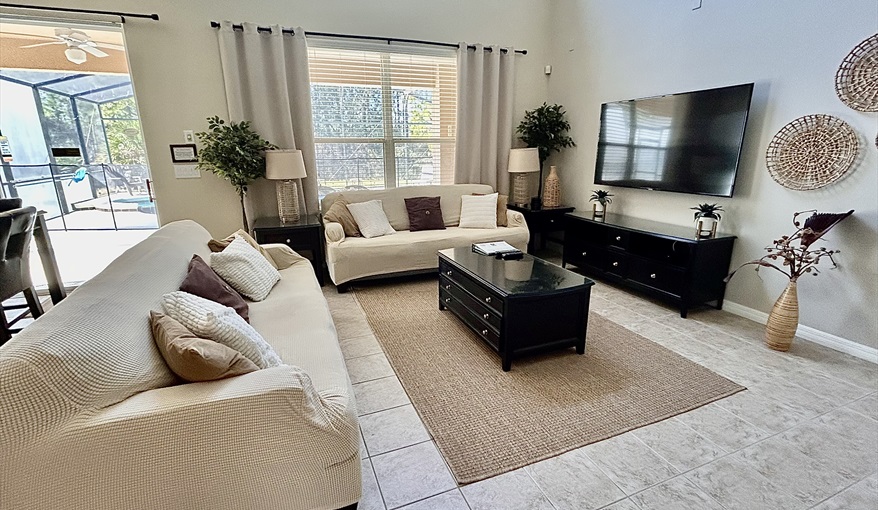 Family Room. Watersong Villa Florida. 6 Bedrooms 5.5 Bathrooms with 4 en-suite. Conservation Views. Pool & Spa.  in Watersong, Davenport, Orlando