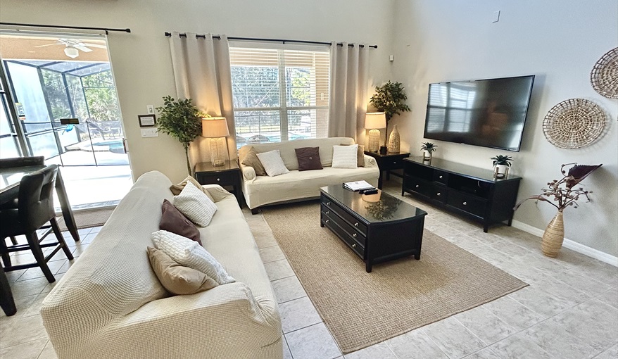 Family Room. Watersong Villa Florida. 6 Bedrooms 5.5 Bathrooms with 4 en-suite. Conservation Views. Pool & Spa.  in Watersong, Davenport, Orlando