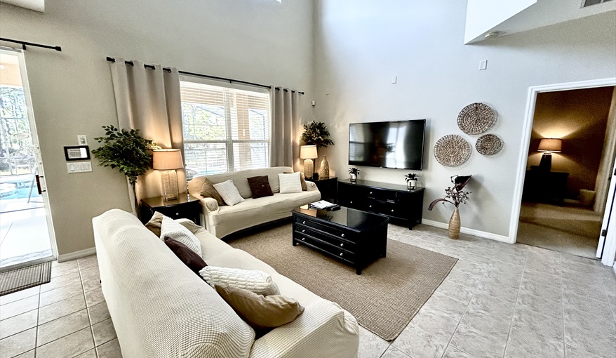 Family Room. Watersong Villa Florida. 6 Bedrooms 5.5 Bathrooms with 4 en-suite. Conservation Views. Pool & Spa.  in Watersong, Davenport, Orlando