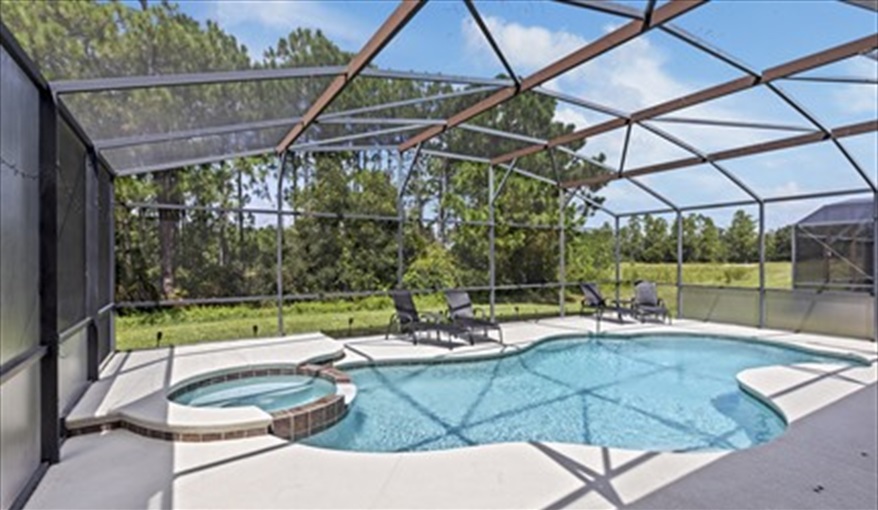 Pool Area View. Watersong Villa Florida. 6 Bedrooms 5.5 Bathrooms with 4 en-suite. Conservation Views. Pool & Spa.  in Watersong, Davenport, Orlando