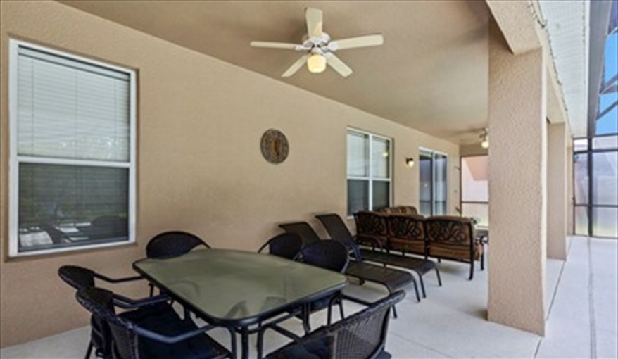 Outdoor Dining Area. Watersong Villa Florida. 6 Bedrooms 5.5 Bathrooms with 4 en-suite. Conservation Views. Pool & Spa.  in Watersong, Davenport, Orlando