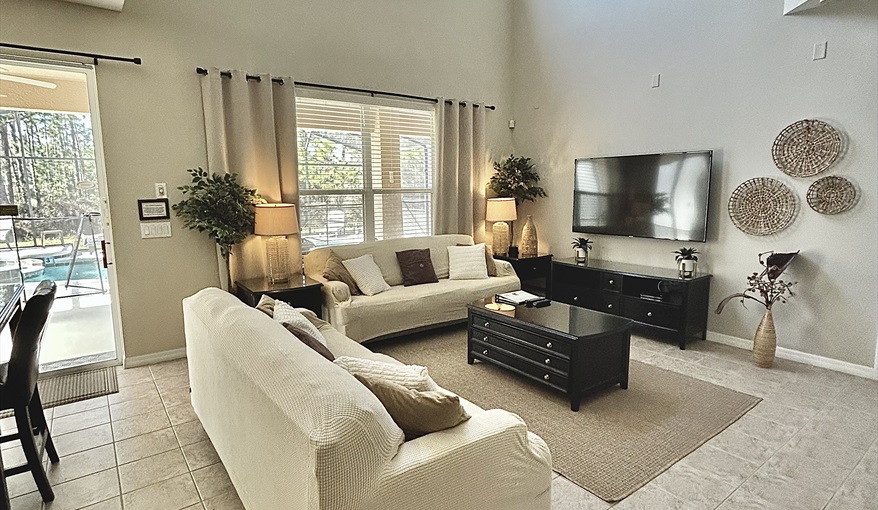 Family Room. Watersong Villa Florida. 6 Bedrooms 5.5 Bathrooms with 4 en-suite. Conservation Views. Pool & Spa.  in Watersong, Davenport, Orlando