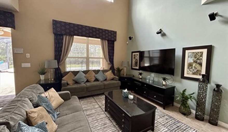 Family Area. Watersong Villa Florida. 6 Bedrooms 5.5 Bathrooms with 4 en-suite. Conservation Views. Pool & Spa.  in Watersong, Davenport, Orlando