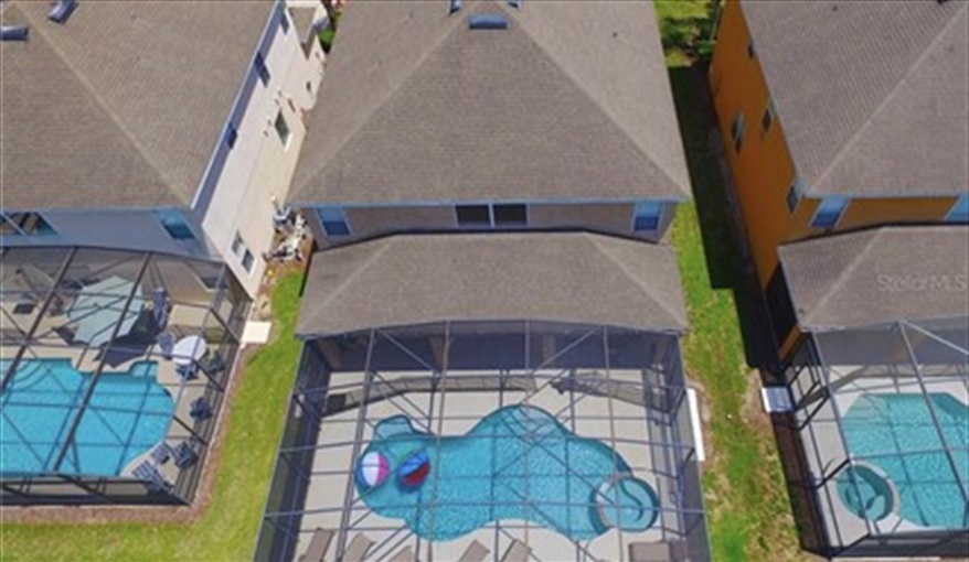 Extended Pool Deck. Watersong Villa Florida. 6 Bedrooms 5.5 Bathrooms with 4 en-suite. Conservation Views. Pool & Spa.  in Watersong, Davenport, Orlando