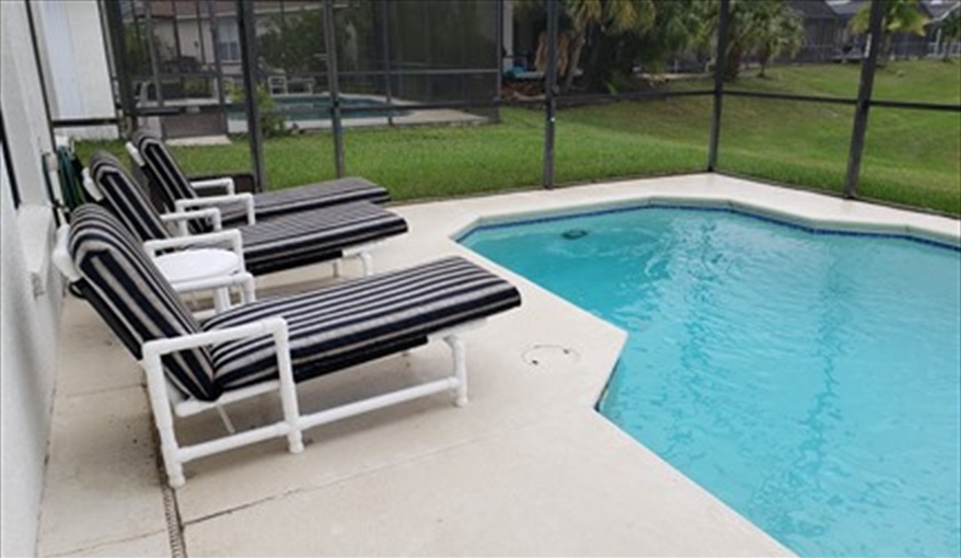 Sun Loungers. Lakeside Lodge at Eagle Pointe in Eagle Pointe, Kissimmee, Orlando